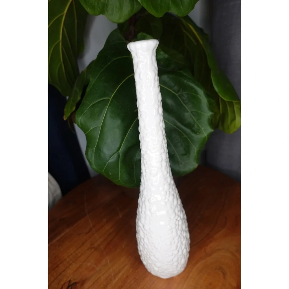 White vase with long neck and‎ gourd like ribbed textured